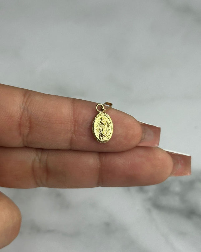 Dije virgen guadalupe ovalada / 0,44 Gr / Oro amarillo 18k