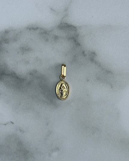 Dije virgen ovalada milagrosa / 0,60 Gr / 1,3 Cm / Oro amarillo 18k