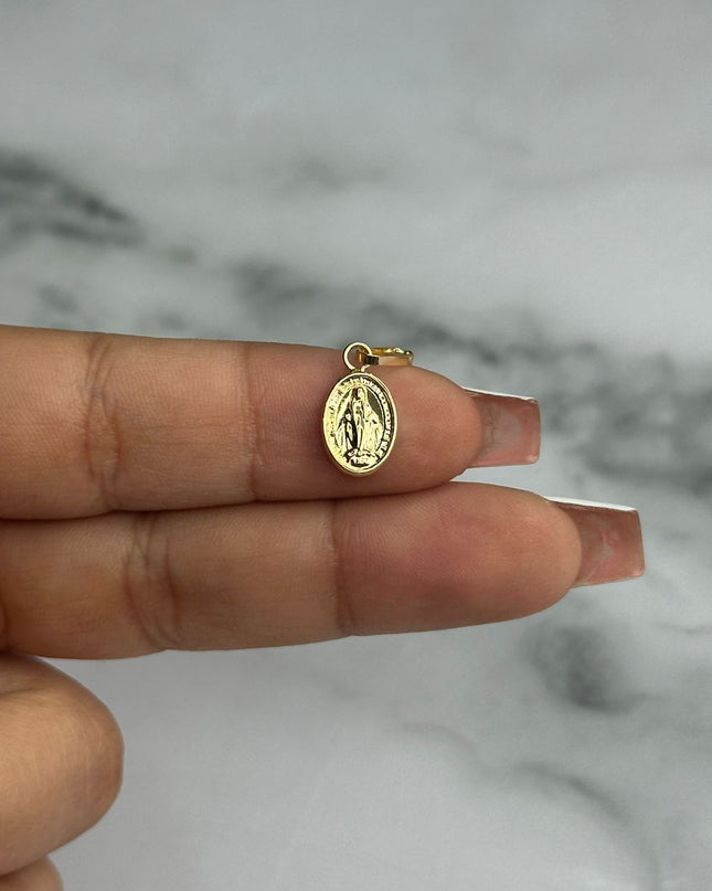 Dije virgen ovalada milagrosa / 0,60 Gr / 1,3 Cm / Oro amarillo 18k