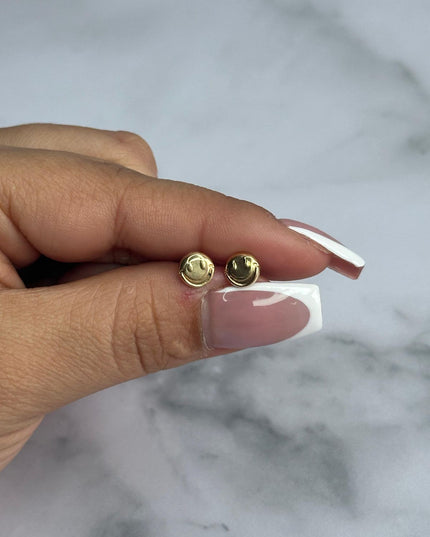 Topos Cara feliz / 0,64 Gr / Oro amarillo 18k