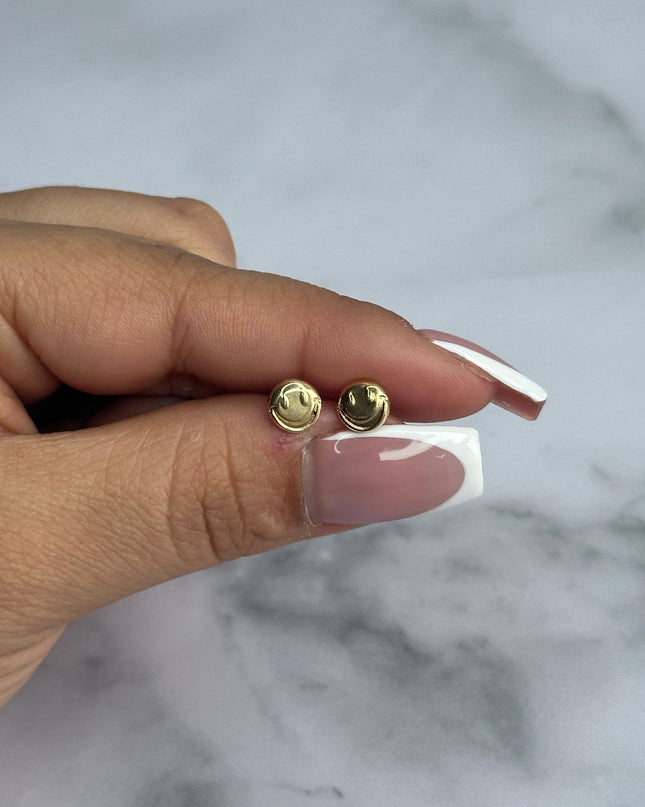 Topos Cara feliz / 0,64 Gr / Oro amarillo 18k
