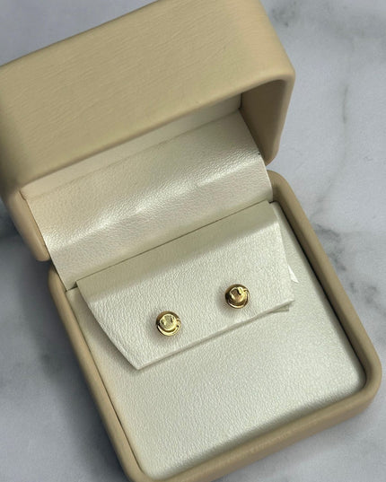 Topos Cara feliz / 0,64 Gr / Oro amarillo 18k