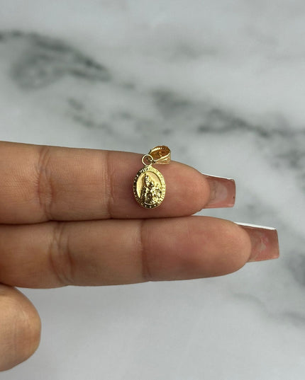 Dije virgen del carmen ovalada doble cara / 0,58 Gr / Oro amarillo 18k