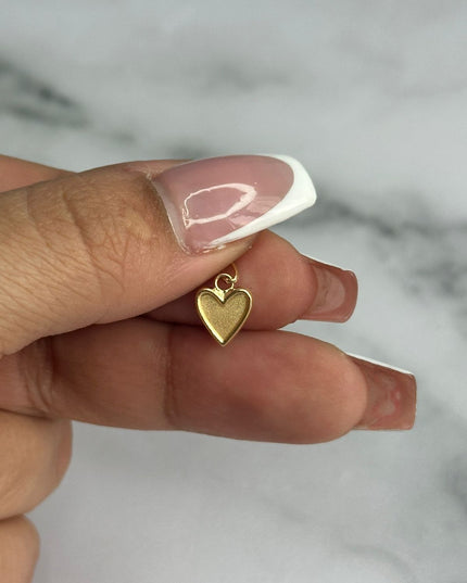Dije corazon liso con borde / 0,34 Gr / 0,9 Cm / Oro amarillo 18k