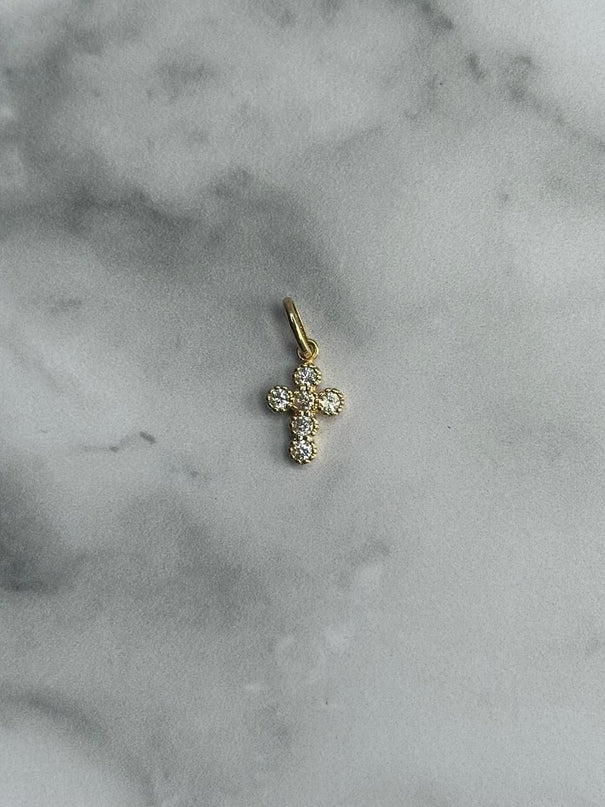 Dije casting cruz mediana / 1,08 Gr / Oro amarillo 18k