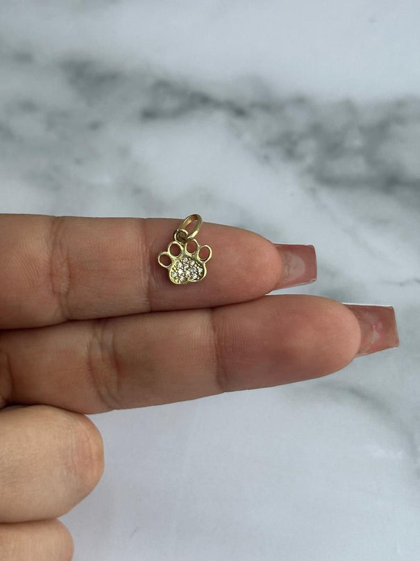 Dije casting huella de perro / 0,69 Gr / Oro amarillo 18k