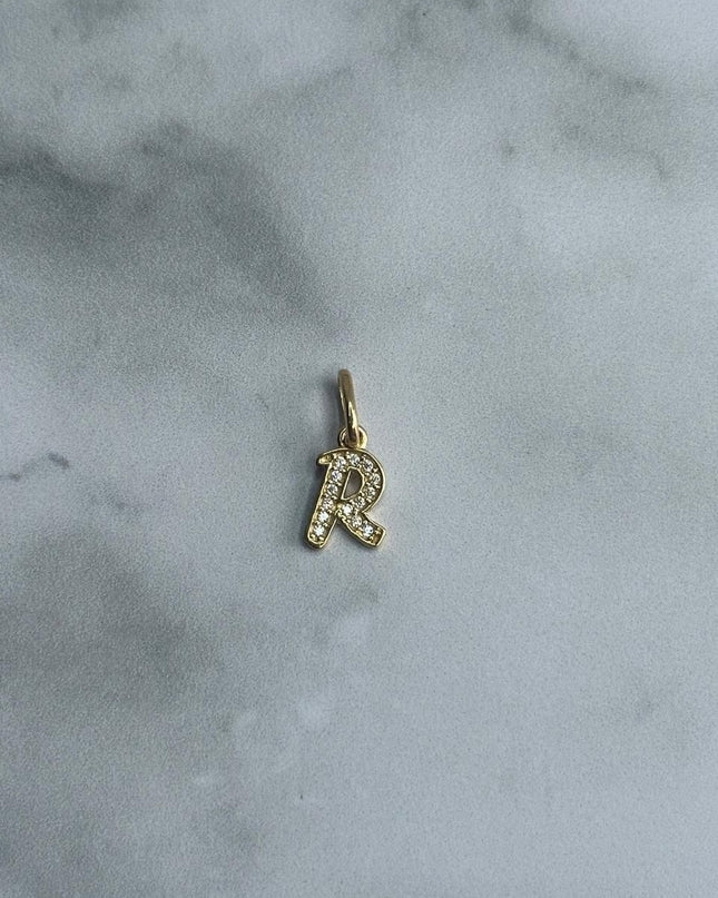 Dije casting letra R / 0,70 Gr / Oro amarillo 18k