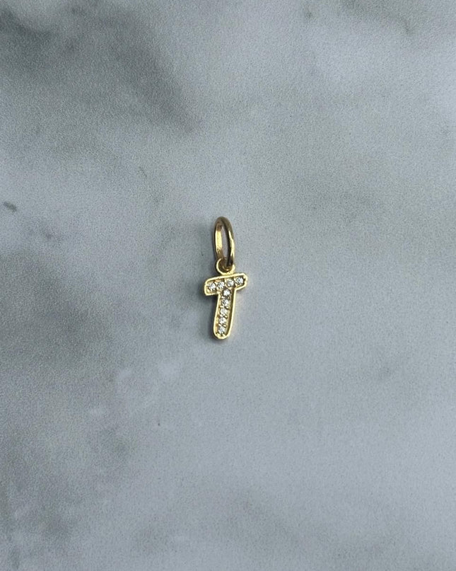 Dije casting letra T / 0,52 Gr / Oro amarillo 18k