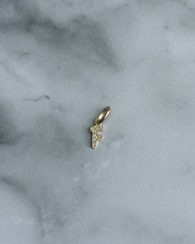 Dije casting letra F / 0,44 Gr / Oro amarillo 18k