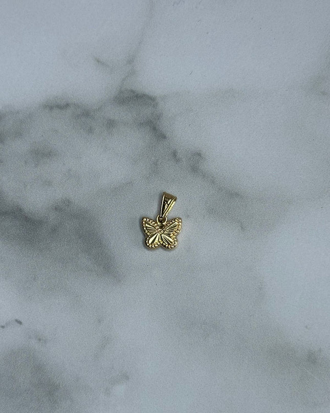 Dije mariposa / 0,49 Gr / Oro amarillo 18k
