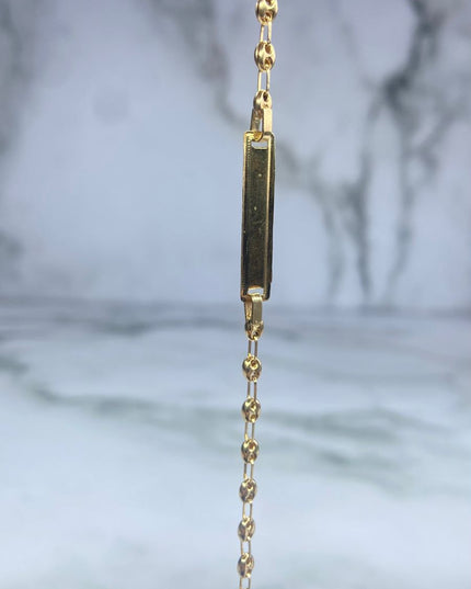 Pulso bebé gc liso con placa / 2,40 Gr Broche 0,40 / 13,5 Cm / Oro amarillo 18k