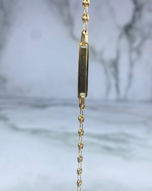 Pulso bebé gc liso con placa / 2,40 Gr Broche 0,40 / 13,5 Cm / Oro amarillo 18k