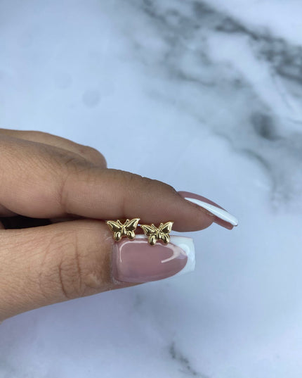 Topos mariposa / 0,69 Gr / Oro amarillo 18k