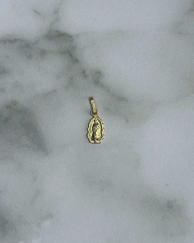Dije virgen guadalupe silueta / 0,38 Gr / 1,3 Cm / Oro amarillo 18k