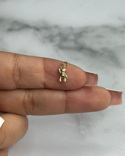 Dije oso mano alzada / 0,24 Gr / Oro amarillo 18k