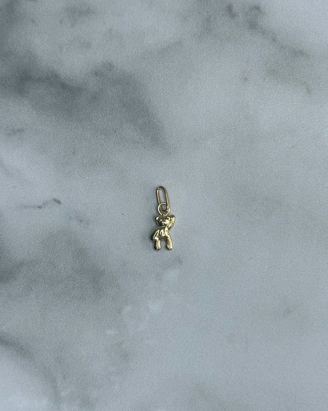 Dije oso mano alzada / 0,24 Gr / Oro amarillo 18k